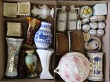 a box with many different types of vases in it