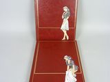 a red book with a picture of a woman on it