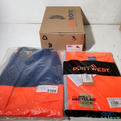 two boxes of shirts are sitting next to each other on a table