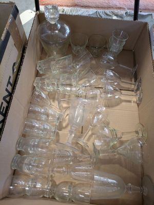 a box full of empty empty glass bottles in it
