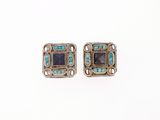 une paire de boucles d'oreilles en argent et turquoise