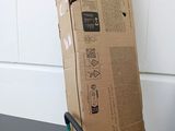 boxes stacked on top of each other in front of a wall