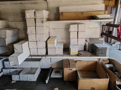 a lot of boxes that are stacked up in a room