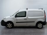 a small white van parked in a parking lot
