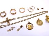 several different types of jewelry are displayed on a white surface