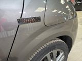 a close up of a car with a sticker on it