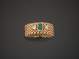 an emerald and diamond ring