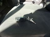 a cell phone that is sitting on the seat of a car