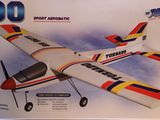 a box with a model of a small airplane in it