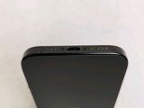 the back side of a black iphone with a camera attached to it