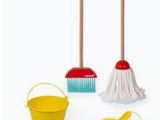 a close up of a set of cleaning tools on a white background
