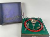 an image of a box with a metal object in it and a box with a metal object in it