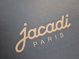 a blue box with a gold logo on it