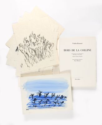 plusieurs livres sur lesquels figurent des dessins d'oiseaux, empilés les uns sur les autres