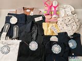 a box full of clothing and a pair of scissors