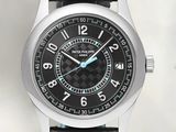 a close up of a black watch with a blue second hand