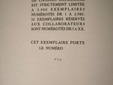 an old book with writing on it in a room