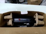 a cardboard box with a remote control inside of it