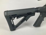 a close up of a rifle on a white background