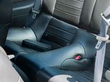 a seat belt that is attached to the back of a car