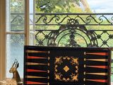 a bench that is sitting in front of a window