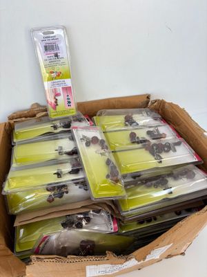 a cardboard box filled with assorted items for sale