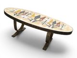 a surfboard that is sitting on top of a table