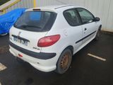 a picture of a white car parked in a parking lot