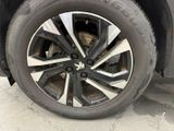 a close up view of a tire on a car
