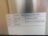a label on the side of a stainless steel refrigerator