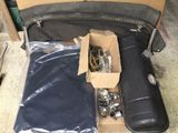 a suitcase with a bunch of items inside of it