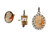 three pieces of jewelry are shown on a white background