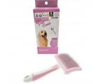 un gros plan sur une brosse pour chien avec un manche rose