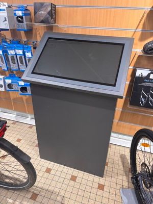 a display of electronic devices on display in a store