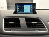the dashboard of a car with a gps device in the center