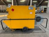 the yellow machine is parked in the warehouse on the concrete floor