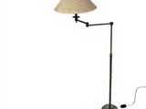 une image représentant une lampe posée sur un pied et dotée d'un abat-jour