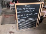 a chalk board that has a list of items on it