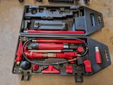 a tool kit that is sitting on the floor