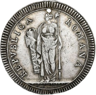une pièce d'argent sur laquelle figure la statue d'une femme tenant une harpe