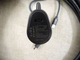 a charger that is connected to a cord on a table