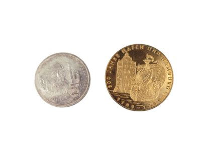 an image of a coin and a coin with a picture of a ship on it