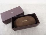 a brown box with a brown object inside of it