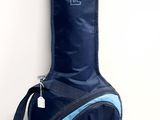 a guitar case sitting against a wall on the floor