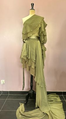 an image of a dress on a mannequin stand