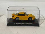 yellow porsche 911 gt3 diecast car in a clear display case