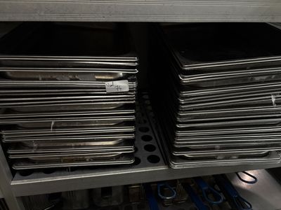 a lot of folders that are on a shelf