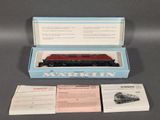 a small box with a train in it on a table