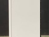 an image of a white refrigerator in a room
