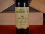 a bottle of wine that is sitting on a table